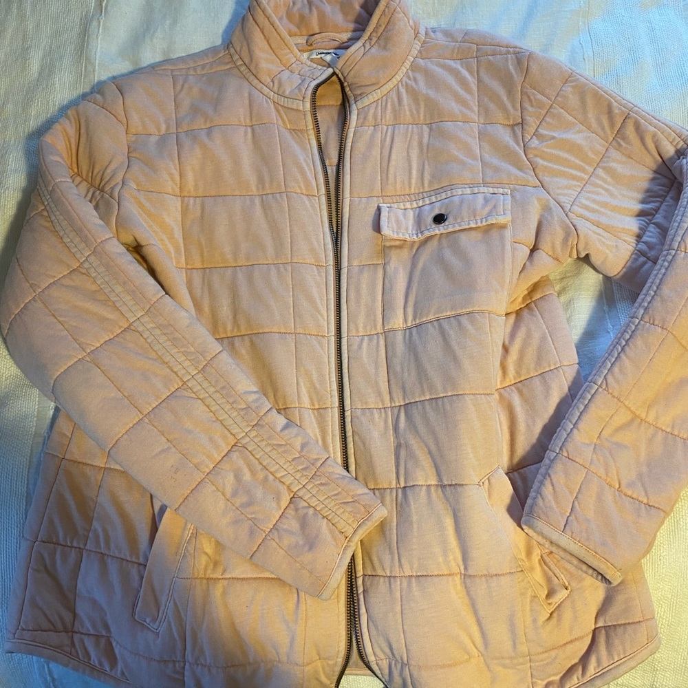 Pink quilted zip up jacket.